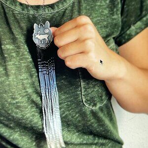CLEMENTINE & SAGE Sterling Caribou/Wolf "Perseverance"Necklace with Blue Fringe